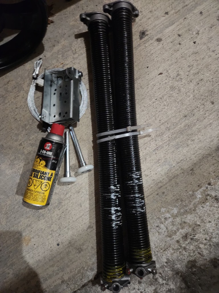 Garage door torsion springs and rollers stocked for Stittsville repair